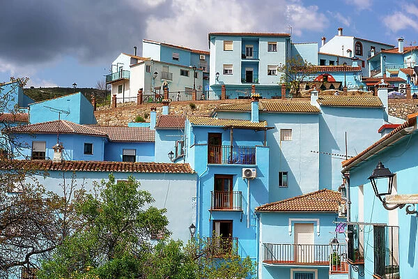 Village street in blue painted Smurf house village of Juzcar, Pueblos Blancos region, Andalusia, Spain, Europe