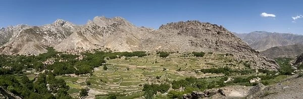 A village and terraced fields of wheat and potatoes in the Panjshir valley, Afghanistan