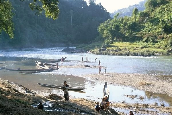 Villagers on banks of Nam Tha River