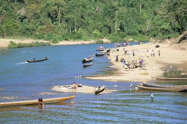 Villagers on banks of Nam Tha River