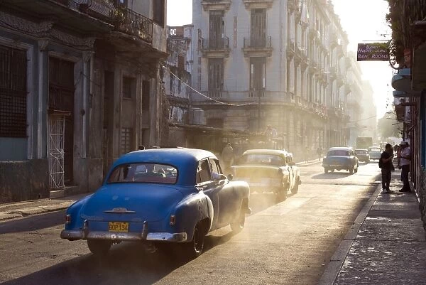 Vintage American cars on Avenue Colon, early morning, Havana Centro, Havana, Cuba, West Indies, Central America