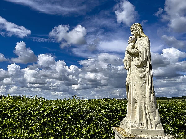 Virgin and Child statue, in a Normandy landscape, Eure, Normandy, France, Europe