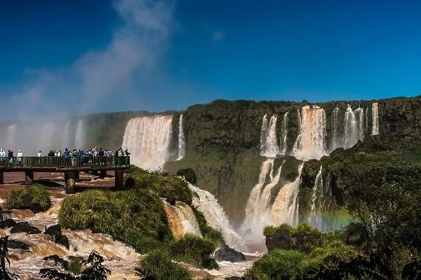 Visitors, drenched in spray, Garganta del Diablo (Devils Throat), Iguazu Falls