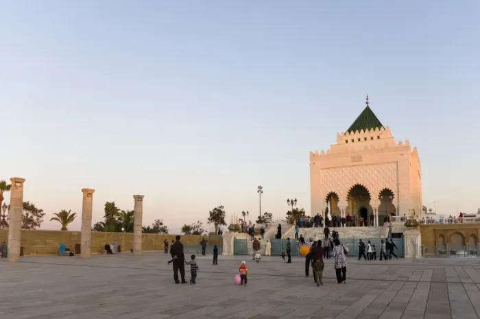 Framed Print : Visitors walk amongst the columns at The Unfinished Hassan Mosque, and the Mausoleum of Mohammed V Framed Print : Visitors walk amongst the columns at The Unfinished Hassan Mosque, and the Mausoleum of Mohammed V