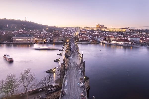 Vltava River and Charles Bridge at sunset, UNESCO World Heritage Site, Prague, Czech Republic