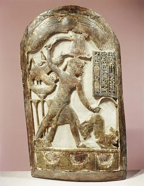 Votive shield showing the king slaying two lions, from the tomb of the pharaoh Tutankhamun