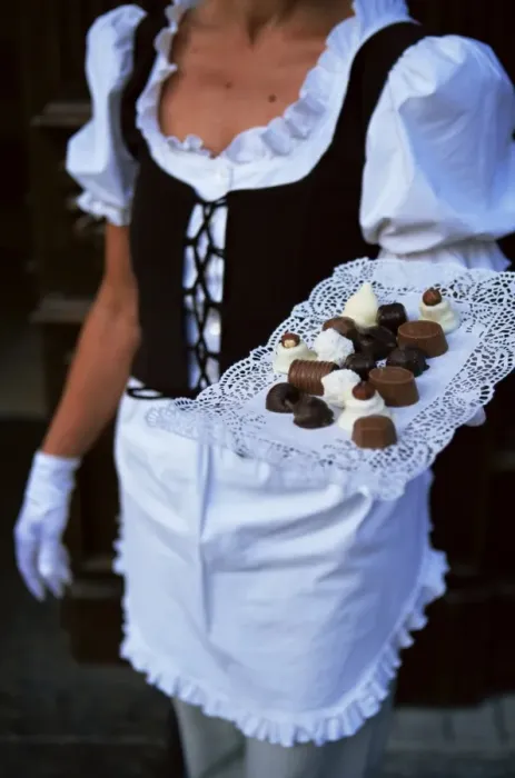 Framed Print : Waitress carrying tray of chocolate Framed Print : Waitress carrying tray of chocolate