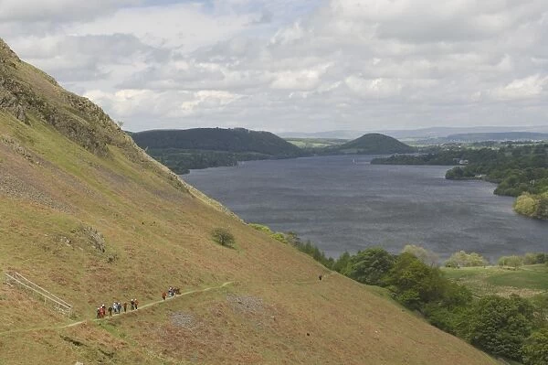 Walkers on the fell path, Lake Ullswater, Lake District National Park, Cumbria