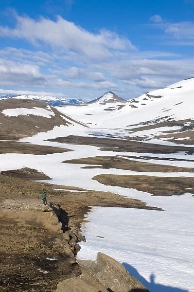 Walkers in mountain landscape covered with ice, Snaefellsjokull National Park