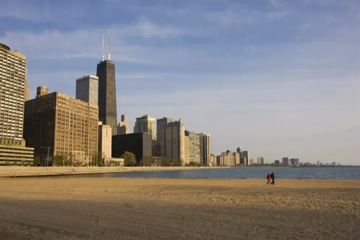 Framed Print : Walkers on Ohio Street Beach with city skyline behind, Chicago, Illinois