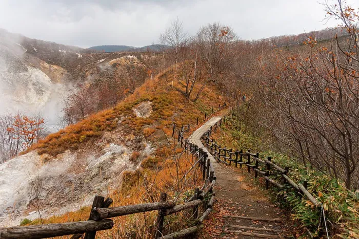 Framed Print : Walking path leading through autumal forest with steaming volcanic valley of Noboribetsu on the left, Hokkaido, Japan, Asia Framed Print : Walking path leading through autumal forest with steaming volcanic valley of Noboribetsu on the left, Hokkaido, Japan, Asia