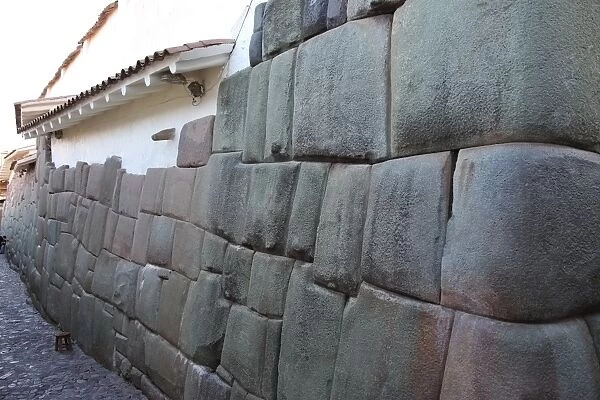 Wall of house made up of part Inca craftmanship and part Spanish workmanship, Cuzco