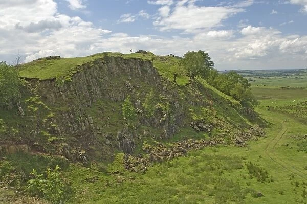 Walltown Crags, walker on the skyline at Turret 45b, Hadrians Wall, Northumbria