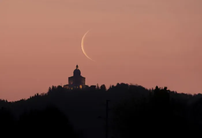 Framed Print : Waning crescent moon at sunrise above San Luca Sanctuary, Bologna, Emilia Romagna, Italy, Europe Framed Print : Waning crescent moon at sunrise above San Luca Sanctuary, Bologna, Emilia Romagna, Italy, Europe