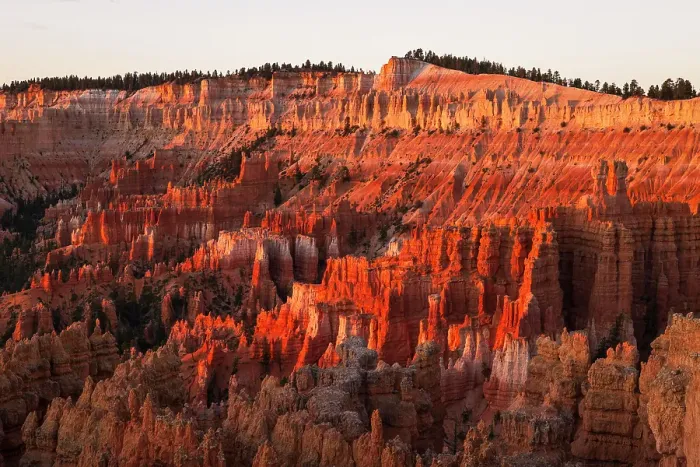 Framed Print : Warm light envelops majestic rock formation in Bryce Canyon National Park during a summer day, Utah, United States of America