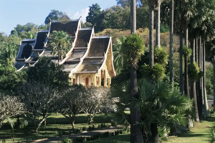 Framed Print : Wat Mai Suwannaphumaham and trees