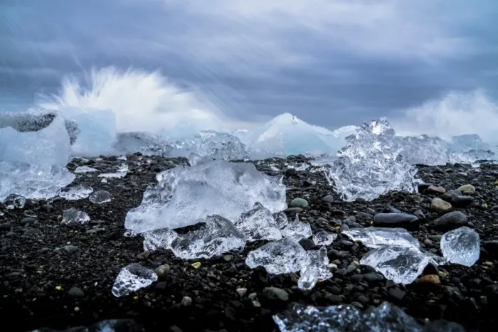 Framed Print : Water crashing over the ice and black sandy beach at Jokulsarlon, Iceland, Polar Regions Framed Print : Water crashing over the ice and black sandy beach at Jokulsarlon, Iceland, Polar Regions