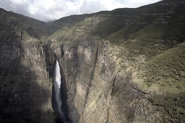 A waterfall at the Geech Abyss, in the Simien Mountains National Park, Ethiopia, Africa