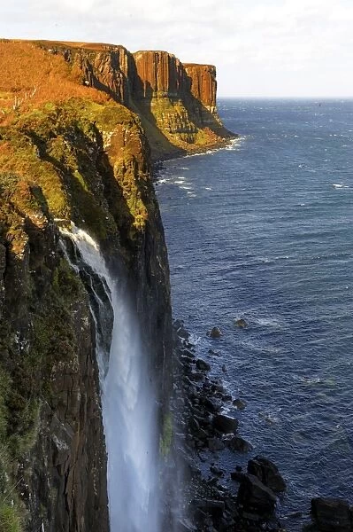 Waterfall at Kilt Rock, famous basaltic cliff near Staffin, Isle of Skye