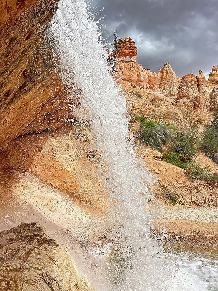 A waterfall running through the Mossy Cave Trail in Bryce Canyon National Park, Utah, United States of America, North America