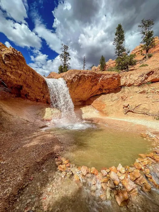 Framed Print : A waterfall running through the Mossy Cave Trail in Bryce Canyon National Park, Utah, United States of America, North America Framed Print : A waterfall running through the Mossy Cave Trail in Bryce Canyon National Park, Utah, United States of America, North America