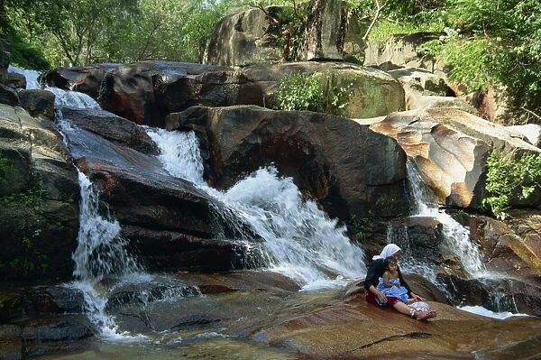 The waterfalls and rocks at Aboretum Forest Recreation Park in Penang