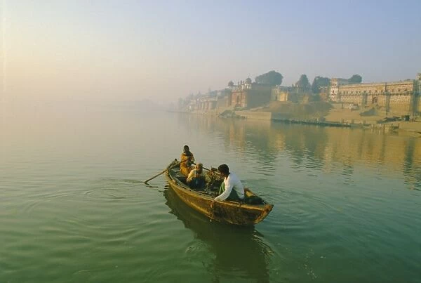Waterfront and boat on the River Ganges (Ganga)