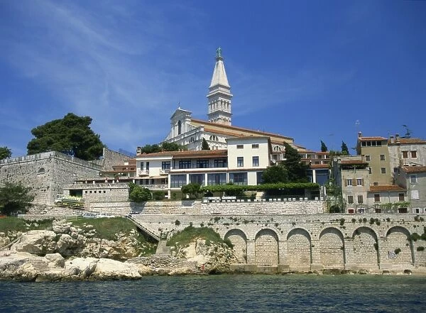 Waterfront and church of St. Euphemia from the west, at Rovinj, Croatia, Europe