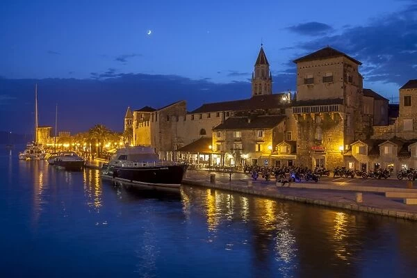 Waterfront lit up at dusk, Trogir, UNESCO World Heritage Site, Dalmatian Coast, Croatia, Europe