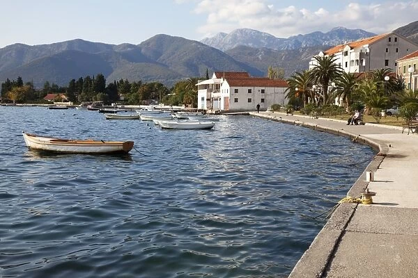 Waterfront near the newly developed Marina in Porto Montenegro with mountains behind