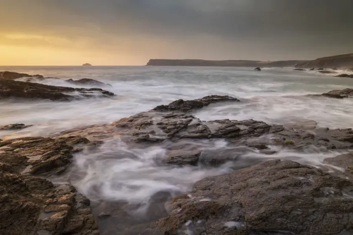 Framed Print : Waves swirl over rocky ledges at sunset on the North Cornwall coast, Cornwall, England Framed Print : Waves swirl over rocky ledges at sunset on the North Cornwall coast, Cornwall, England
