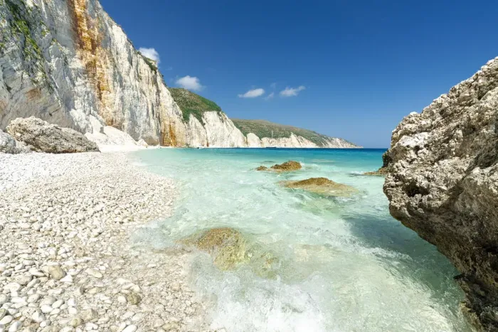 Framed Print : Waves of the turquoise clear sea washing the white stones of Fteri Beach, Kefalonia, Ionian Islands, Greek Islands, Greece, Europe Framed Print : Waves of the turquoise clear sea washing the white stones of Fteri Beach, Kefalonia, Ionian Islands, Greek Islands, Greece, Europe