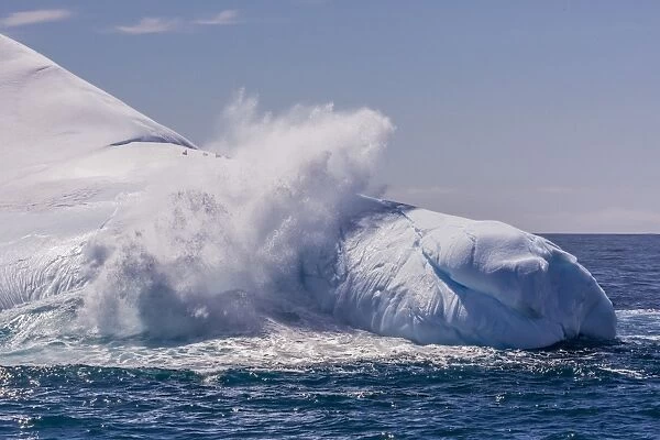 Waves washing over iceberg near Elephant Island, South Shetland Islands, Antarctica, Polar Regions