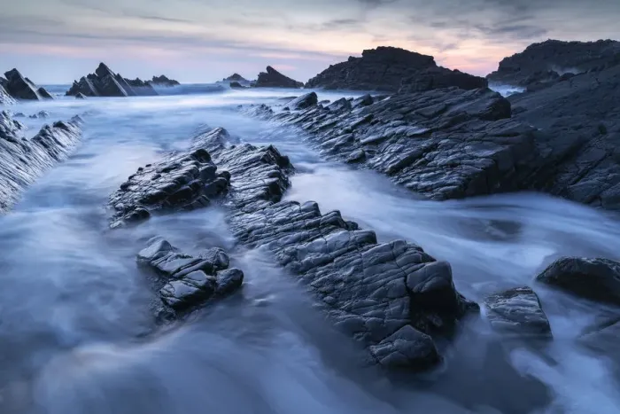 Framed Print : Waves and wet rock ledges at Hartland Quay in North Devon at sunset, Devon, England Framed Print : Waves and wet rock ledges at Hartland Quay in North Devon at sunset, Devon, England