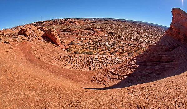 A wavy sandstone slope, a fossilized sand dune, at Ferry Swale in the Glen Canyon Recreation Area near Page, Arizona, United States of America, North America