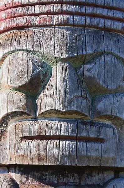 Weathered face on Totem Pole outside the Maritime Museum, Vancouver, British Columbia