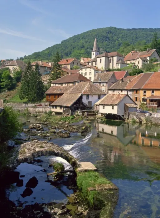 Framed Print : The weir and remains of a medieval bridge on the River Loue, with the houses Framed Print : The weir and remains of a medieval bridge on the River Loue, with the houses