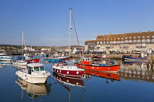 West Bay harbour with yachts and fishing boats, Bridport, gateway town for the Jurassic Coast, UNESCO World Heritage Site, Dorset, England, United Kingdom, Europe