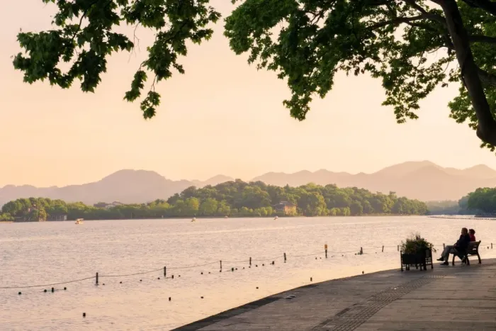 Framed Print : West Lake shore with hilly landscape and silhouettes, Hangzhou, Zhejiang, China, Asia Framed Print : West Lake shore with hilly landscape and silhouettes, Hangzhou, Zhejiang, China, Asia