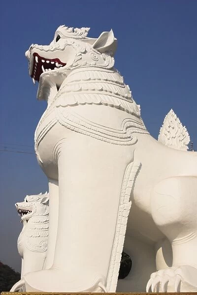 White carved lions guard entrance to Mandalay Hill, Mandalay, Myanmar (Burma), Asia