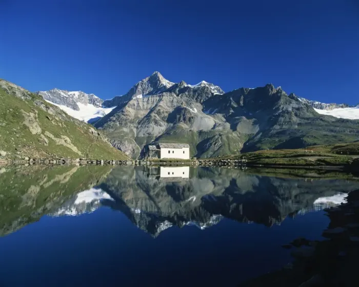 Framed Print : White chapel and Ober Gabelhorn reflected in the Schwarzsee Framed Print : White chapel and Ober Gabelhorn reflected in the Schwarzsee