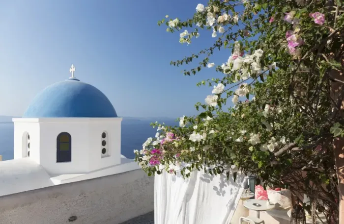 Framed Print : White church with blue dome and flowers, Oia, Santorini, Cyclades, Greek Islands Framed Print : White church with blue dome and flowers, Oia, Santorini, Cyclades, Greek Islands
