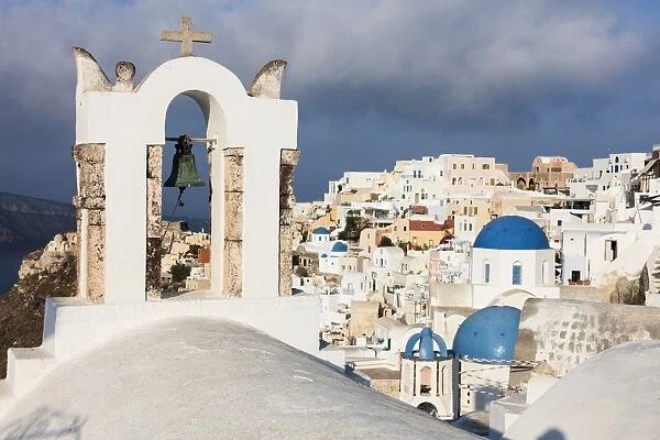 The white of the church and houses and the blue of Aegean Sea as symbols of Greece