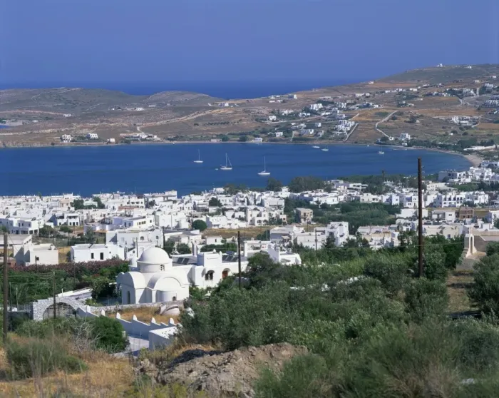Framed Print : White church and houses overlooking a bay on Paros Framed Print : White church and houses overlooking a bay on Paros