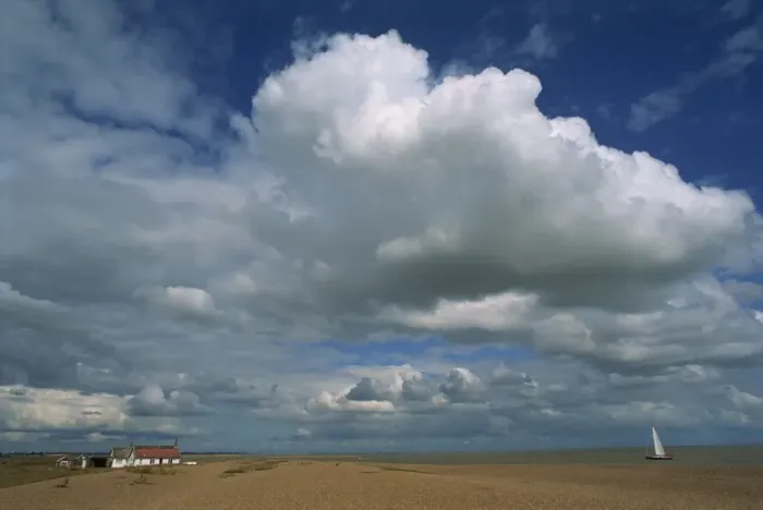 Framed Print : White clouds in a blue sky at Shingle Street near Felixstowe, Suffolk, England Framed Print : White clouds in a blue sky at Shingle Street near Felixstowe, Suffolk, England