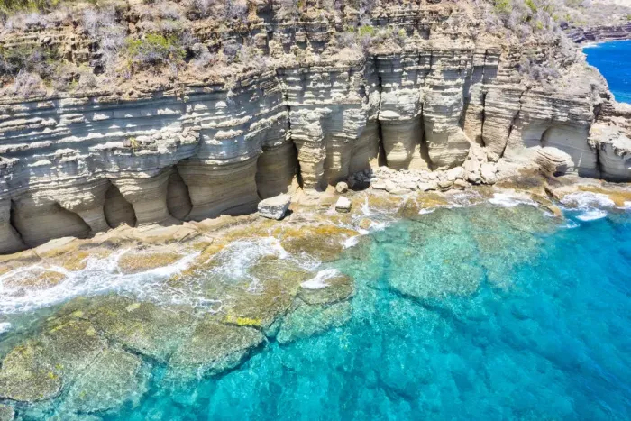 Framed Print : White limestone cliffs Pillar of Hercules washed by Caribbean Sea, aerial view by drone Framed Print : White limestone cliffs Pillar of Hercules washed by Caribbean Sea, aerial view by drone