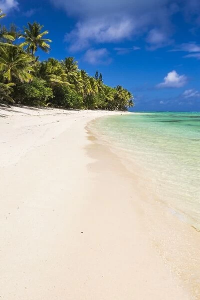 White sandy beach and palm trees on tropical Rarotonga Island, Cook Islands, South Pacific