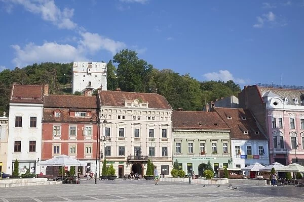 White Tower and buildings in Piata Sfatului, Brasov, Transylvania, Romania, Europe