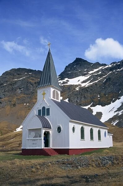 White wooden church with spire at Grytviken on South Georgia