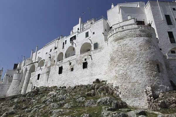 The whitewashed city wall, including a defensive tower, in the white city (Citta Bianca)